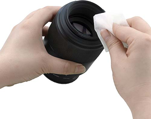 Cleaning a camera lens
